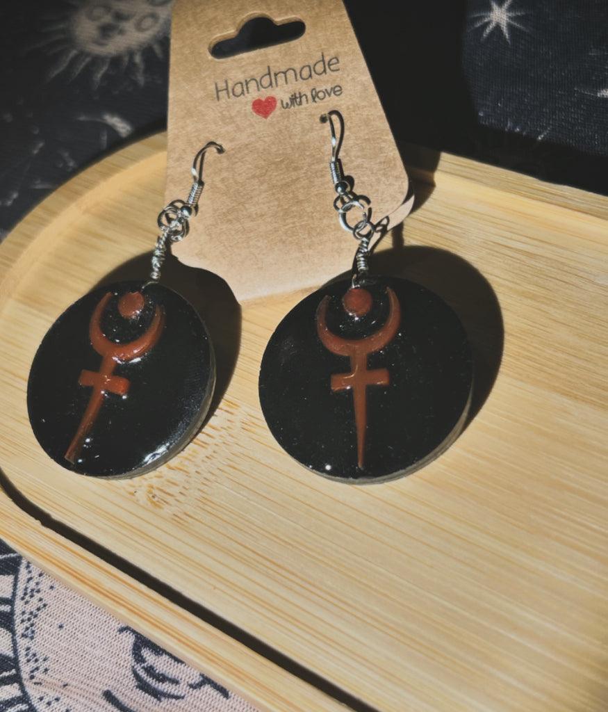 Side view of Hades handmade drop style earrings 