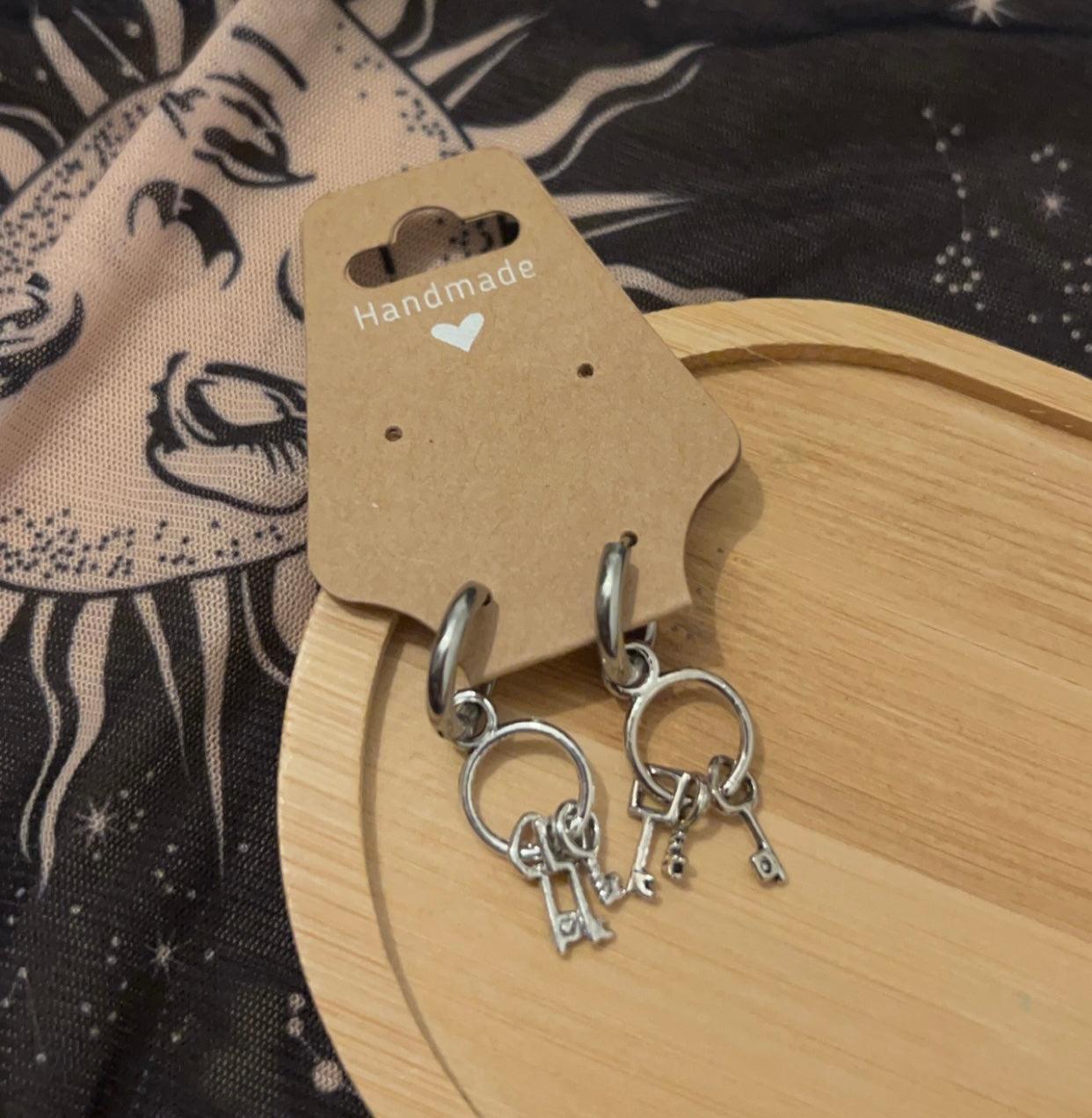 Keeper of keys, stainless steel silver hooped earrings adorned with 3 keys per earring to honour the goddess Hekate. 