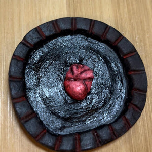My heart incense holder. Black incense holder with an anatomical heart in the centre